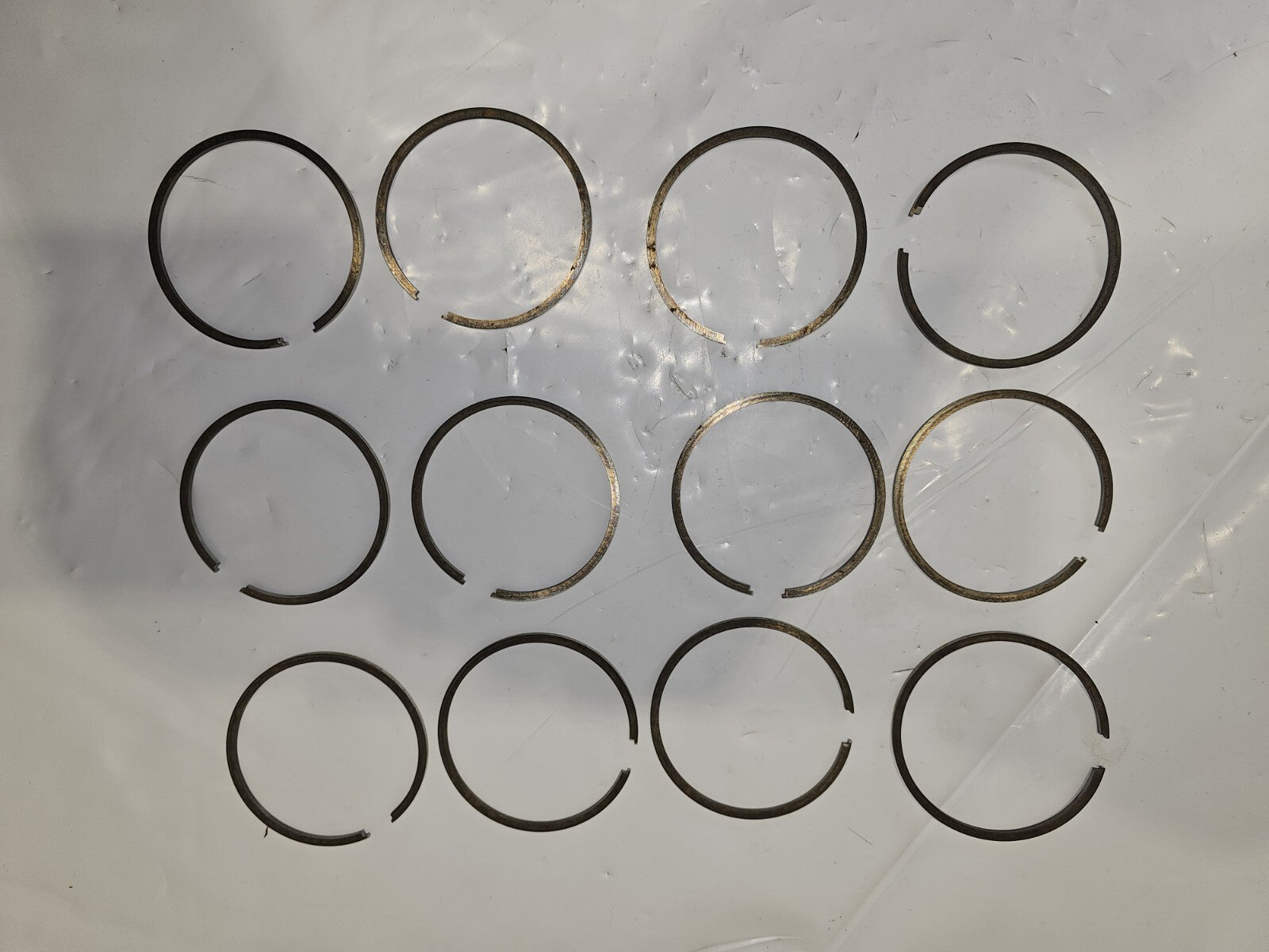 12 NEW OEM MERCURY QUICKSILVER PISTON RING SET OF 12    39-31329A12