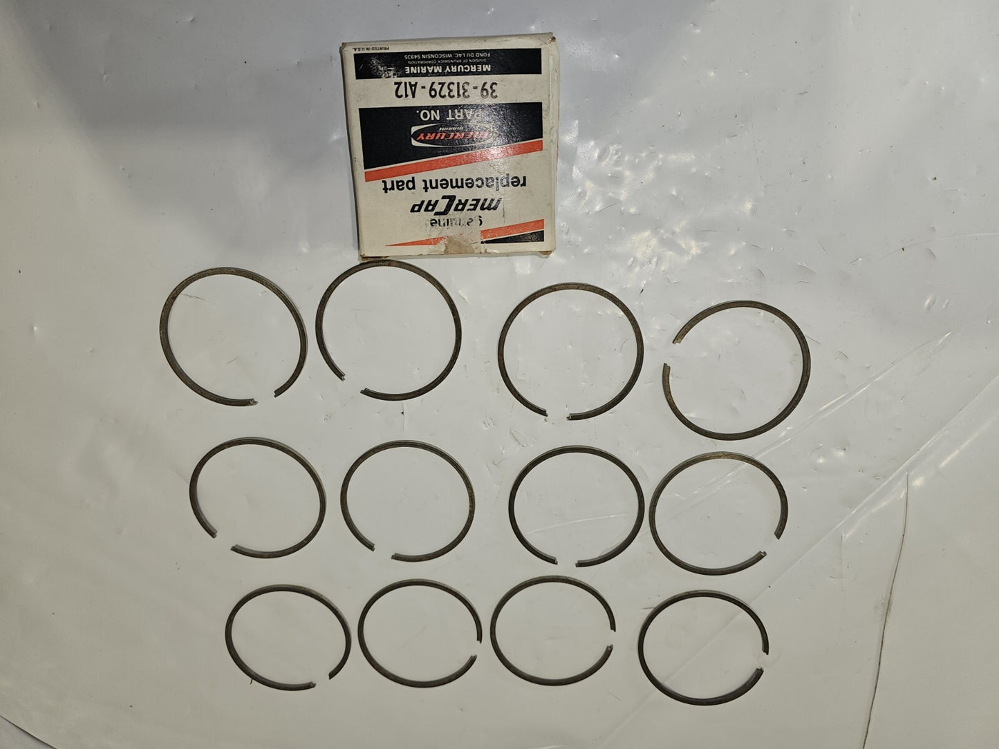 12 NEW OEM MERCURY QUICKSILVER PISTON RING SET OF 12    39-31329A12