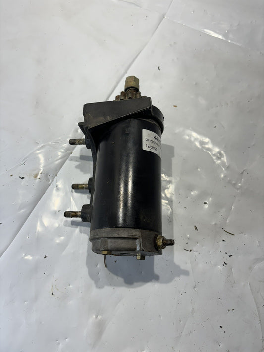 Starter and bracket from 50 HP Force outboard motor 1989
